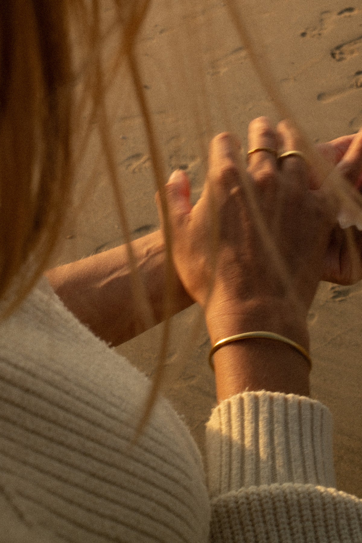 Anne Thaléa gold rings worn on the hand