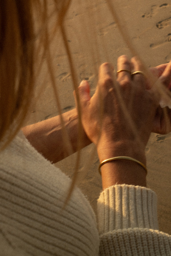 Anne Thaléa gold rings worn on the hand
