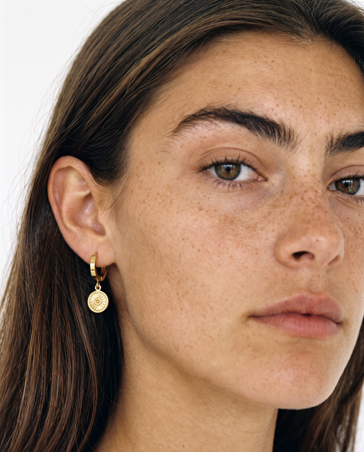 Flower Drop Hoops worn by a model
